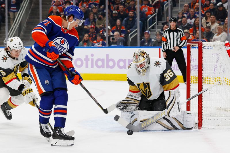 Nov 28, 2023; Edmonton, Alberta, CAN; Vegas Golden Knights goaltender Logan Thompson (36) makes a save on a shot by Edmonton Oilers forward Ryan McLeod (71) during the first period at Rogers Place. Mandatory Credit: Perry Nelson-USA TODAY Sports