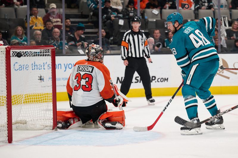 Nov 7, 2023; San Jose, California, USA; San Jose Sharks center Tomas Hertl (48) watches the puck in the net after a goal is scored against Philadelphia Flyers goaltender Samuel Ersson (33) during the second period at SAP Center at San Jose. Mandatory Credit: Robert Edwards-USA TODAY Sports