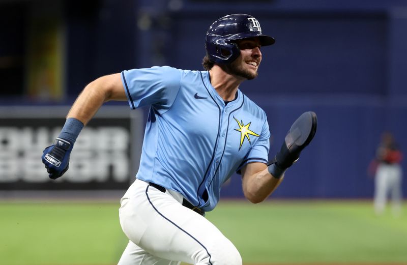 Jul 30, 2024; St. Petersburg, Florida, USA;  Tampa Bay Rays outfielder Josh Lowe (15) runs home to score a run against the Miami Marlins during the sixth inning at Tropicana Field. Mandatory Credit: Kim Klement Neitzel-USA TODAY Sports