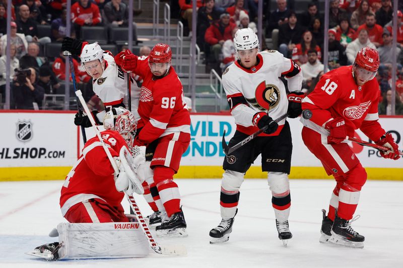 Jan 31, 2024; Detroit, Michigan, USA;  Ottawa Senators center Shane Pinto (57) tries to deflect the puck in front of Detroit Red Wings goaltender Alex Lyon (34) in the first period at Little Caesars Arena. Mandatory Credit: Rick Osentoski-USA TODAY Sports