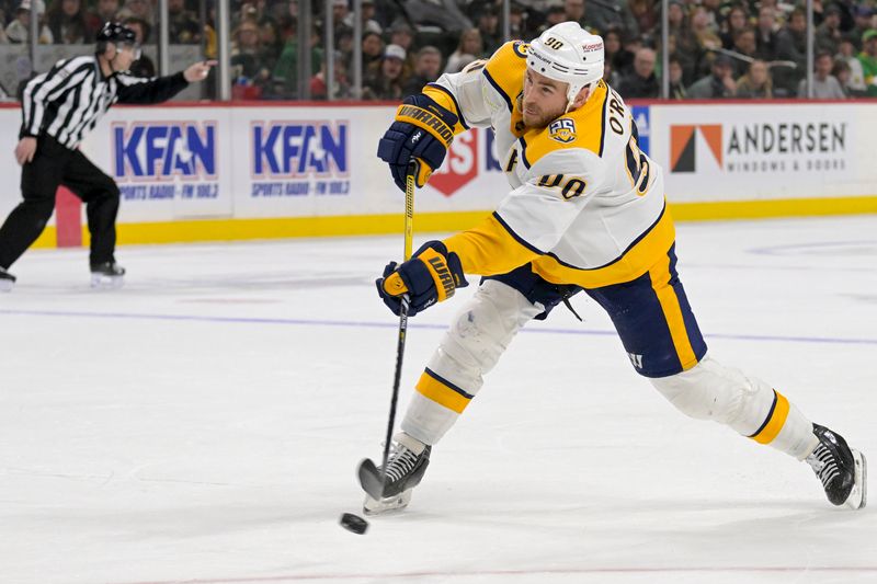 Mar 10, 2024; Saint Paul, Minnesota, USA;  Nashville Predators forward Ryan O'Reilly (90) scores a power play goal against the Minnesota Wild during the third period at Xcel Energy Center. Mandatory Credit: Nick Wosika-USA TODAY Sports


