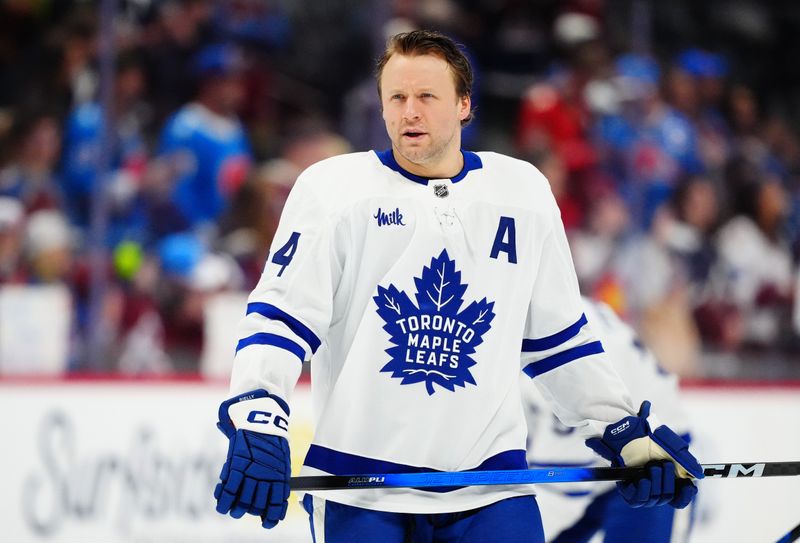 Jan 12, 2026; Denver, Colorado, USA; Toronto Maple Leafs defenseman Morgan Rielly (44) before the game against the Colorado Avalanche at Ball Arena. Mandatory Credit: Ron Chenoy-Imagn Images