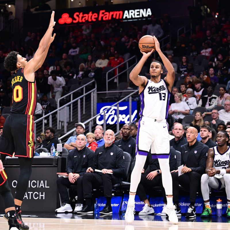 ATLANTA, GA - NOVEMBER 1: Keegan Murray #13 of the Sacramento Kings shoots a three point basket during the game against the Atlanta Hawks on November 1, 2024 at State Farm Arena in Atlanta, Georgia.  NOTE TO USER: User expressly acknowledges and agrees that, by downloading and/or using this Photograph, user is consenting to the terms and conditions of the Getty Images License Agreement. Mandatory Copyright Notice: Copyright 2024 NBAE (Photo by Adam Hagy/NBAE via Getty Images)