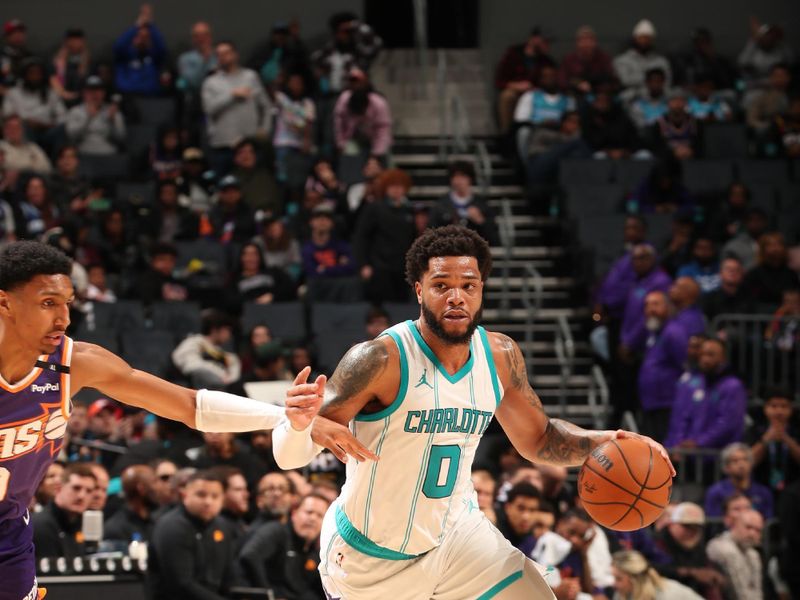 CHARLOTTE, NC - JANUARY 7: Miles Bridges #0 of the Charlotte Hornets drives to the basket during the game against the Phoenix Suns on January 7, 2025 at Spectrum Center in Charlotte, North Carolina. NOTE TO USER: User expressly acknowledges and agrees that, by downloading and or using this photograph, User is consenting to the terms and conditions of the Getty Images License Agreement. Mandatory Copyright Notice: Copyright 2025 NBAE (Photo by Kent Smith/NBAE via Getty Images)