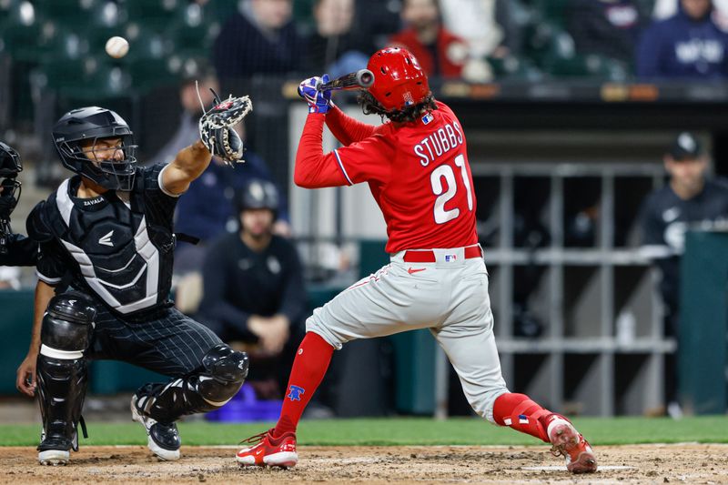 Apr 18, 2023; Chicago, Illinois, USA; Philadelphia Phillies catcher Garrett Stubbs (21) is hit by a pitch from Chicago White Sox starting pitcher Lucas Giolito (not pictured) during the sixth inning of game two of the doubleheader at Guaranteed Rate Field. Mandatory Credit: Kamil Krzaczynski-USA TODAY Sports