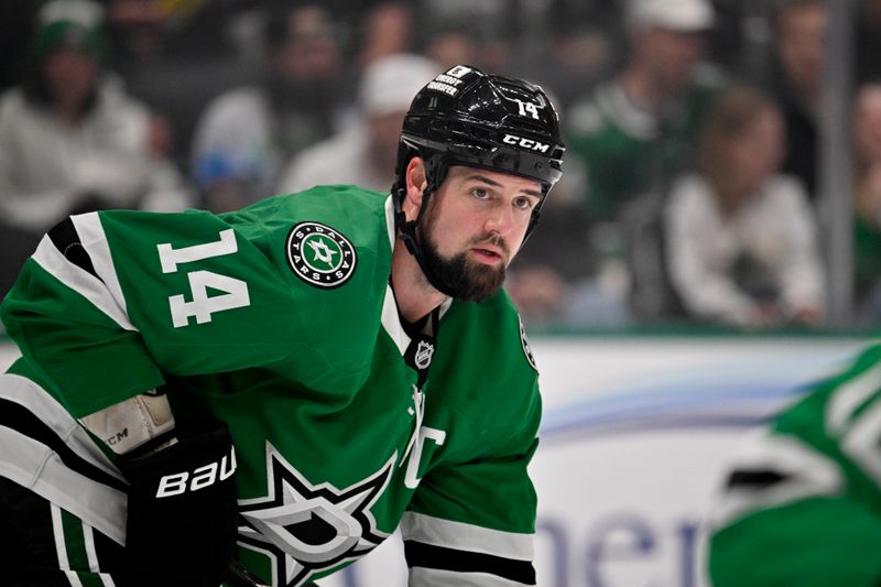 Nov 18, 2025; Dallas, Texas, USA; Dallas Stars left wing Jamie Benn (14) looks on during the face-off against the New York Islanders during the first period at the American Airlines Center. Mandatory Credit: Jerome Miron-Imagn Images