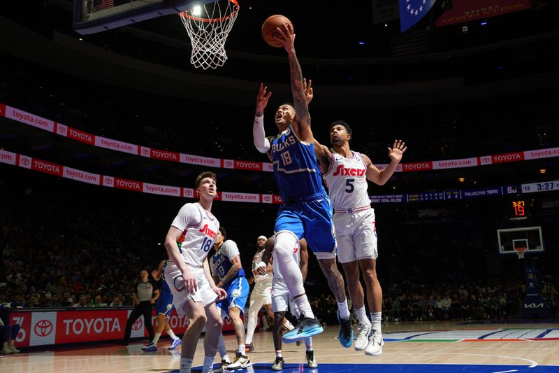 PHILADELPHIA, PA - APRIL 3: Kyle Kuzma #18 of the Milwaukee Bucks drives to the basket during the game against the Philadelphia 76ers on April 3, 2025 at the Wells Fargo Center in Philadelphia, Pennsylvania NOTE TO USER: User expressly acknowledges and agrees that, by downloading and/or using this Photograph, user is consenting to the terms and conditions of the Getty Images License Agreement. Mandatory Copyright Notice: Copyright 2025 NBAE (Photo by Jesse D. Garrabrant/NBAE via Getty Images)