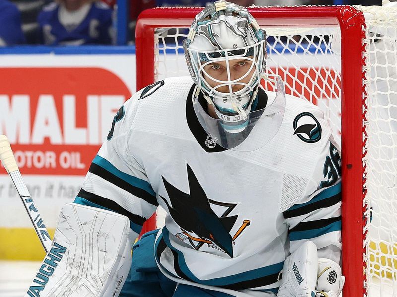 Oct 26, 2023; Tampa, Florida, USA; San Jose Sharks goaltender Kaapo Kahkonen (36) looks on against the Tampa Bay Lightning during the third period at Amalie Arena. Mandatory Credit: Kim Klement Neitzel-USA TODAY Sports