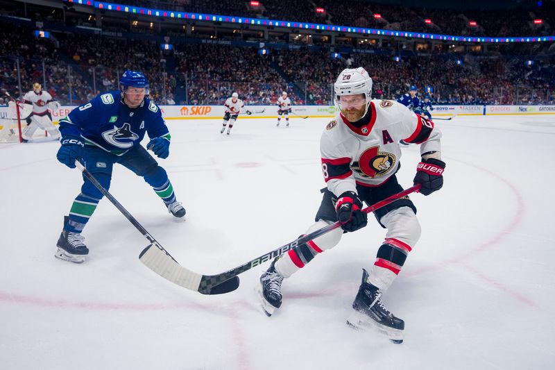 Jan 2, 2024; Vancouver, British Columbia, CAN; Vancouver Canucks forward J.T. Miller (9) pursues Ottawa Senators forward Claude Giroux (28) in the third period at Rogers Arena. Mandatory Credit: Bob Frid-USA TODAY Sports