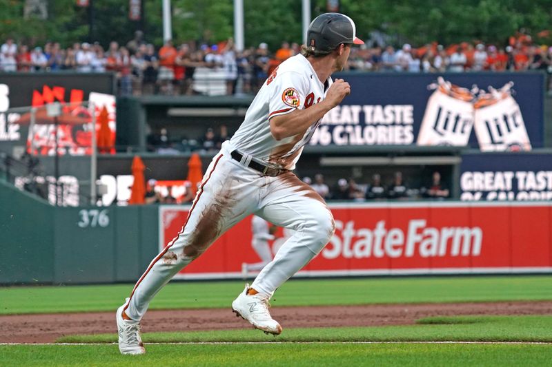 Jul 30, 2023; Baltimore, Maryland, USA; Baltimore Orioles second baseman Jordan Westburg (11) rounds third base to score a run in the first inning against the New York Yankees at Oriole Park at Camden Yards. Mandatory Credit: Mitch Stringer-USA TODAY Sports