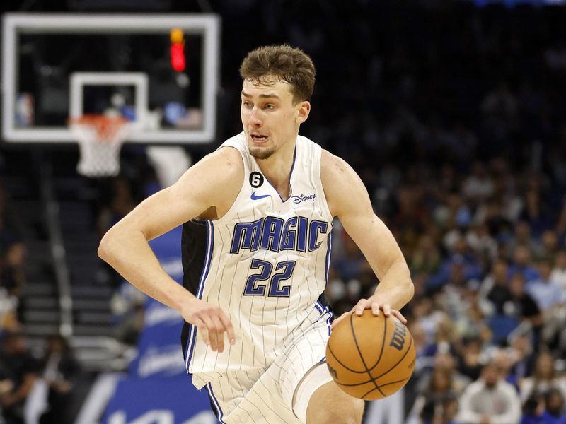 ORLANDO, FLORIDA - JANUARY 25: Franz Wagner #22 of the Orlando Magic drives to the basket during a game against the Indiana Pacers at Amway Center on January 25, 2023 in Orlando, Florida. NOTE TO USER: User expressly acknowledges and agrees that, by downloading and or using this photograph, User is consenting to the terms and conditions of the Getty Images License Agreement. (Photo by Mike Ehrmann/Getty Images)