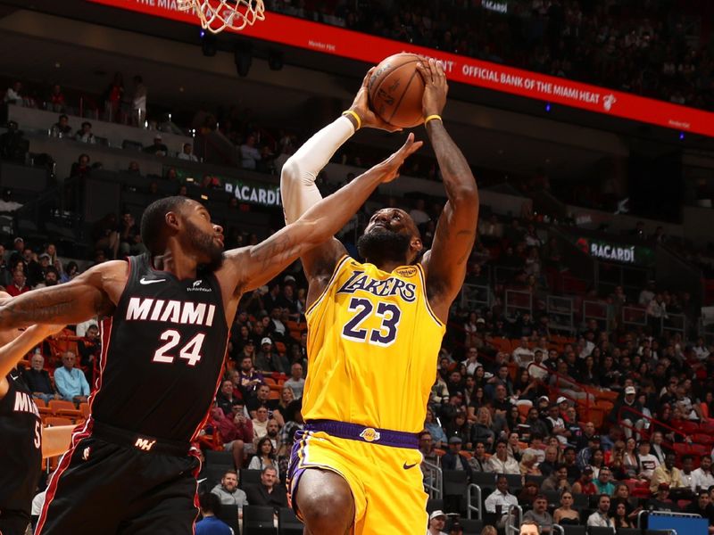 MIAMI, FL - DECEMBER 4: LeBron James #23 of the Los Angeles Lakers drives to the basket during the game against the Miami Heat on December 4, 2024 at Kaseya Center in Miami, Florida. NOTE TO USER: User expressly acknowledges and agrees that, by downloading and or using this Photograph, user is consenting to the terms and conditions of the Getty Images License Agreement. Mandatory Copyright Notice: Copyright 2024 NBAE (Photo by Issac Baldizon/NBAE via Getty Images)