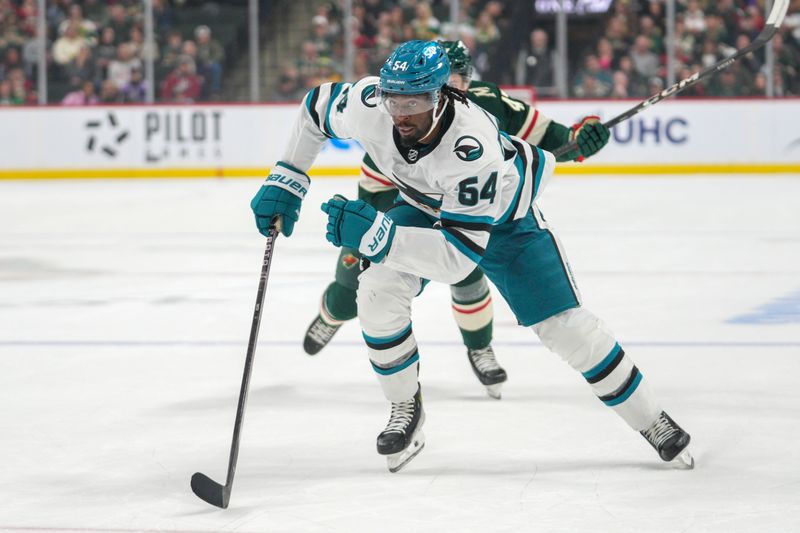 Mar 3, 2024; Saint Paul, Minnesota, USA; San Jose Sharks center Mikael Granlund (64) skates to the puck against the Minnesota Wild in the first period at Xcel Energy Center. Mandatory Credit: Matt Blewett-USA TODAY Sports