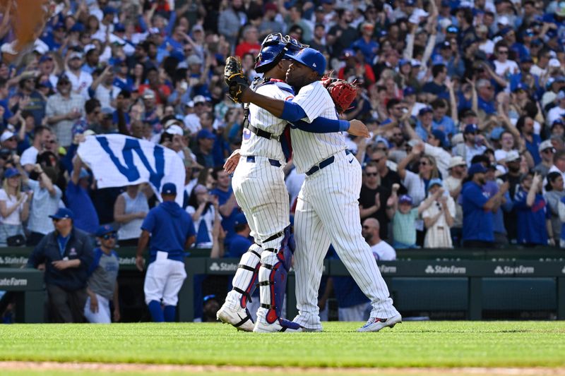 May 4, 2024; Chicago, Illinois, USA; Chicago Cubs pitcher Héctor Neris (51) hugs catcher Miguel Amaya (9)  after beating the Milwaukee Brewers  at Wrigley Field. Mandatory Credit: Matt Marton-USA TODAY Sports