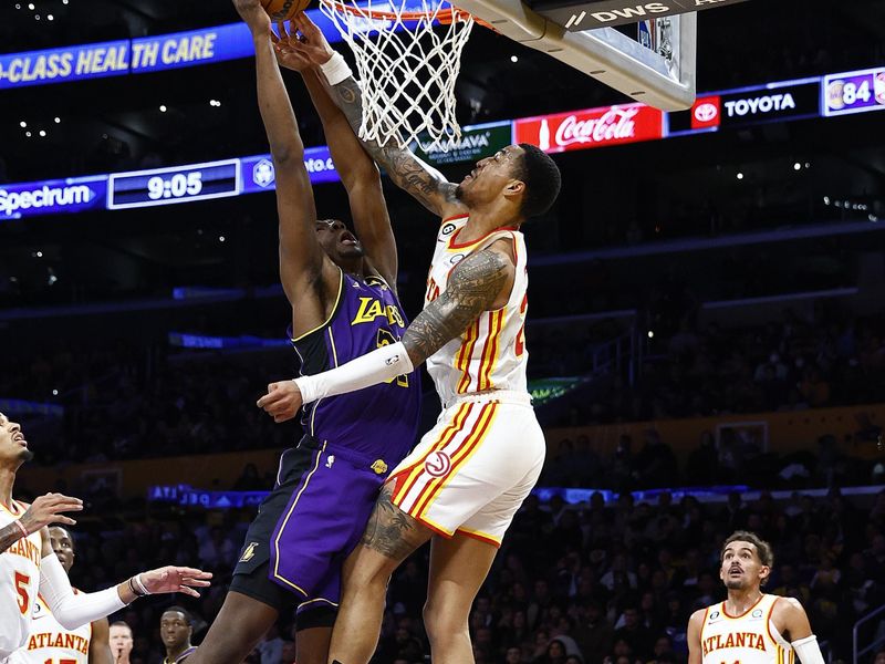 LOS ANGELES, CALIFORNIA - JANUARY 06:  Thomas Bryant #31 of the Los Angeles Lakers takes a shot against John Collins #20 of the Atlanta Hawks in the second half at Crypto.com Arena on January 06, 2023 in Los Angeles, California.  NOTE TO USER: User expressly acknowledges and agrees that, by downloading and/or using this photograph, user is consenting to the terms and conditions of the Getty Images License Agreement.  (Photo by Ronald Martinez/Getty Images)