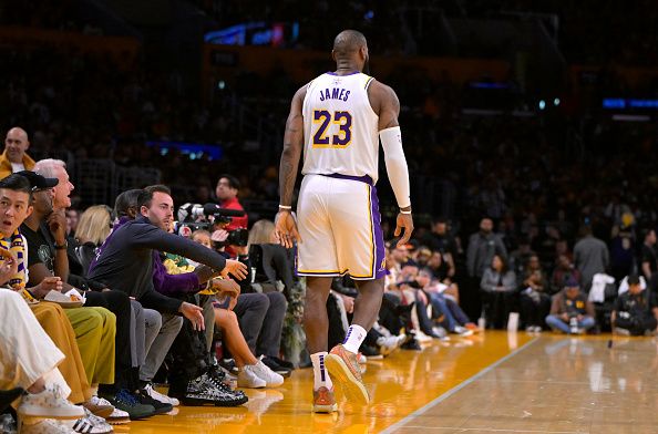 LOS ANGELES, CALIFORNIA - DECEMBER 25: LeBron James #23 of the Los Angeles Lakers walks on the court after a basket against the Boston Celtics at Crypto.com Arena on December 25, 2023 in Los Angeles, California. NOTE TO USER: User expressly acknowledges and agrees that, by downloading and or using this photograph, User is consenting to the terms and conditions of the Getty Images License Agreement.(Photo by Jayne Kamin-Oncea/Getty Images)