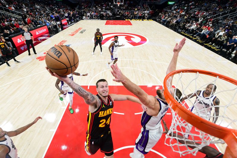 ATLANTA, GA - NOVEMBER 1: Garrison Mathews #24 of the Atlanta Hawks drives to the basket during the game against the Sacramento Kings on November 1, 2024 at State Farm Arena in Atlanta, Georgia.  NOTE TO USER: User expressly acknowledges and agrees that, by downloading and/or using this Photograph, user is consenting to the terms and conditions of the Getty Images License Agreement. Mandatory Copyright Notice: Copyright 2024 NBAE (Photo by Adam Hagy/NBAE via Getty Images)