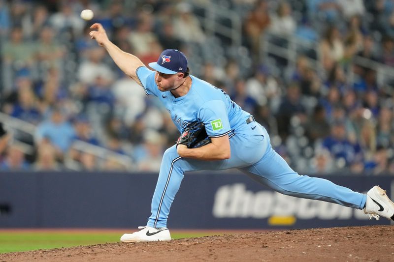 May 22, 2024; Toronto, Ontario, CAN; Toronto Blue Jays pitcher Nate Pearson (24) pitches to the Chicago White Sox during the ninth inning at Rogers Centre. Mandatory Credit: John E. Sokolowski-USA TODAY Sports