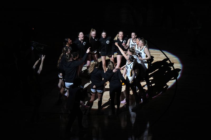 Mar 24, 2023; Seattle, WA, USA; Iowa Hawkeyes players huddle before the game against the Colorado Buffaloes at Climate Pledge Arena. Mandatory Credit: Kirby Lee-USA TODAY Sports