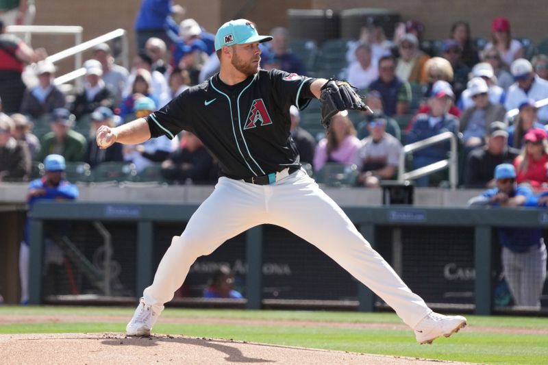 Mar 3, 2025; Salt River Pima-Maricopa, Arizona, USA; Arizona Diamondbacks pitcher Corbin Burnes (39) throws against the Chicago Cubs in the first inning at Salt River Fields at Talking Stick. Mandatory Credit: Rick Scuteri-Imagn Images