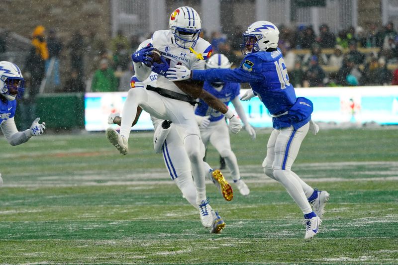 Oct 28, 2023; Fort Collins, Colorado, USA;  Colorado State Rams wide receiver Tory Horton (14) makes as catch with Air Force Falcons safety Jayden Goodwin (16) defending at Sonny Lubick Field at Canvas Stadium. Mandatory Credit: Michael Madrid-USA TODAY Sports