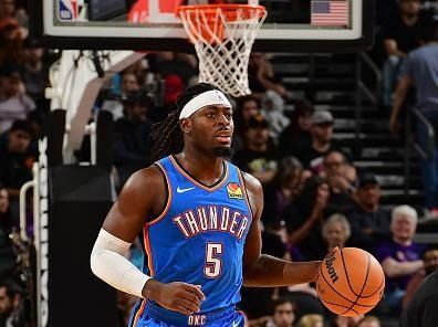 PHOENIX, AZ - NOVEMBER  12:  Luguentz Dort #5 of the Oklahoma City Thunder dribbles the ball during the game against the Phoenix Suns on November 12, 2023 at Footprint Center in Phoenix, Arizona. NOTE TO USER: User expressly acknowledges and agrees that, by downloading and or using this photograph, user is consenting to the terms and conditions of the Getty Images License Agreement. Mandatory Copyright Notice: Copyright 2023 NBAE (Photo by Kate Frese/NBAE via Getty Images)