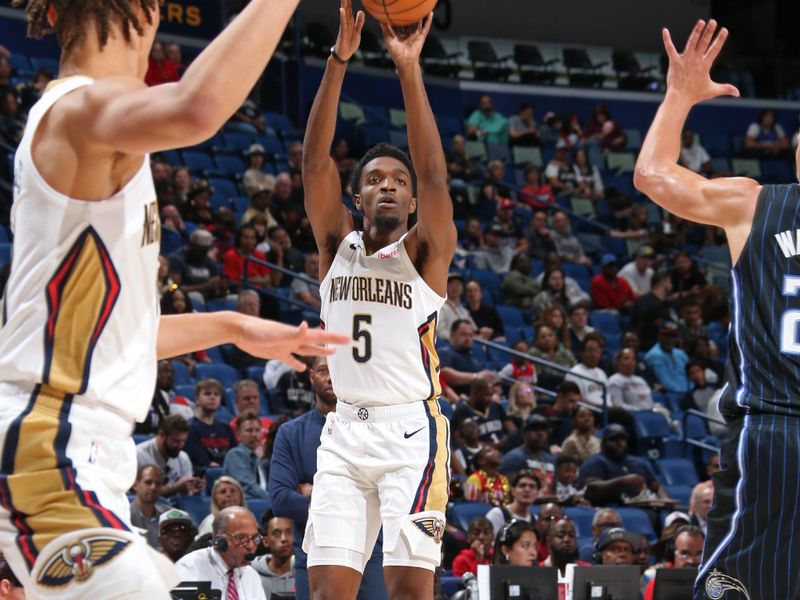 NEW ORLEANS, LA - OCTOBER 10: Herb Jones #5 of the New Orleans Pelicans shoots the ball during the game against the Orlando Magic on October 10, 2023 at the Smoothie King Center in New Orleans, Louisiana. NOTE TO USER: User expressly acknowledges and agrees that, by downloading and or using this Photograph, user is consenting to the terms and conditions of the Getty Images License Agreement. Mandatory Copyright Notice: Copyright 2023 NBAE (Photo by Layne Murdoch Jr./NBAE via Getty Images)