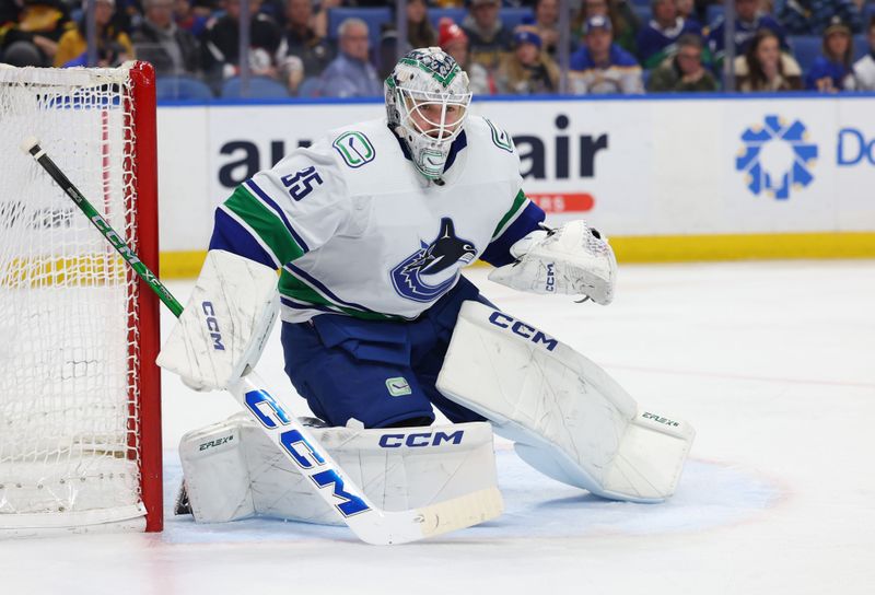 Jan 13, 2024; Buffalo, New York, USA;  Vancouver Canucks goaltender Thatcher Demko (35) looks for the puck during the second period against the Buffalo Sabres at KeyBank Center. Mandatory Credit: Timothy T. Ludwig-USA TODAY Sports