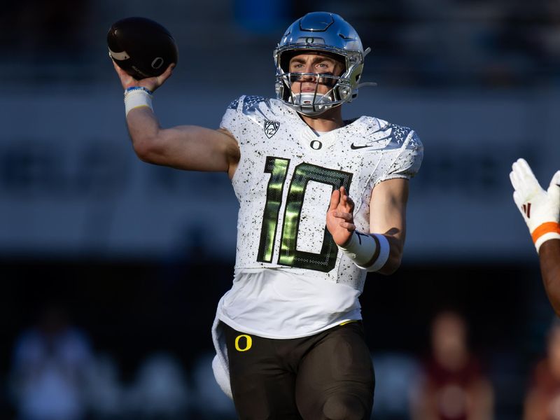 Nov 18, 2023; Tempe, Arizona, USA; Oregon Ducks quarterback Bo Nix (10) against the Arizona State Sun Devils in the first half at Mountain America Stadium. Mandatory Credit: Mark J. Rebilas-USA TODAY Sports