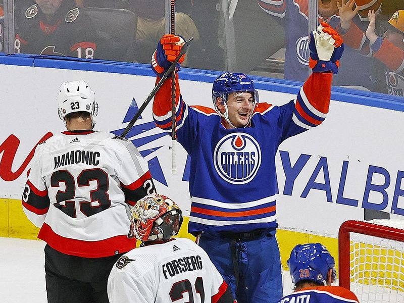 Jan 6, 2024; Edmonton, Alberta, CAN; Edmonton Oilers forward Zach Hyman (18) celebrates after scoring his third goal of the game against Ottawa Senators goaltender Anton Forsberg (31) during the third period at Rogers Place. Mandatory Credit: Perry Nelson-USA TODAY Sports