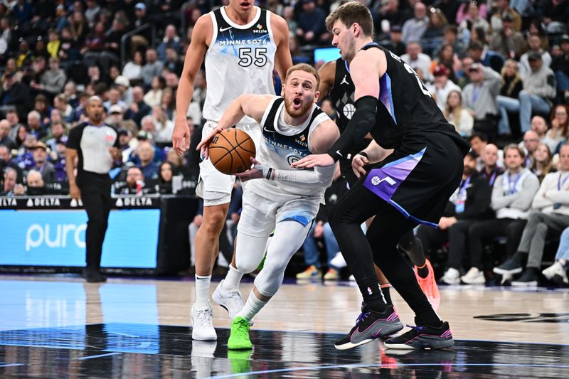 SALT LAKE CITY, UT - FEBRUARY 28:  Donte DiVincenzo #0 of the Minnesota Timberwolves dribbles the ball during the game against the Utah Jazz on February 28, 2025 at Delta Center in Salt Lake City, Utah. NOTE TO USER: User expressly acknowledges and agrees that, by downloading and or using this Photograph, User is consenting to the terms and conditions of the Getty Images License Agreement. Mandatory Copyright Notice: Copyright 2025 NBAE (Photo by Jamie Sabau/NBAE via Getty Images)