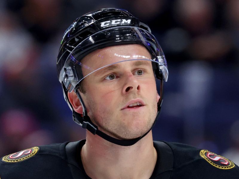 Oct 15, 2025; Buffalo, New York, USA;  Ottawa Senators right wing Olle Lycksell (15) during a stoppage in play against the Buffalo Sabres at KeyBank Center. Mandatory Credit: Timothy T. Ludwig-Imagn Images