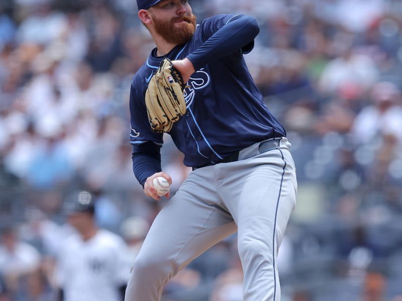 Jul 22, 2024; Bronx, New York, USA; Tampa Bay Rays starting pitcher Zack Littell (52) pitches against the New York Yankees during the first inning at Yankee Stadium. Mandatory Credit: Brad Penner-USA TODAY Sports