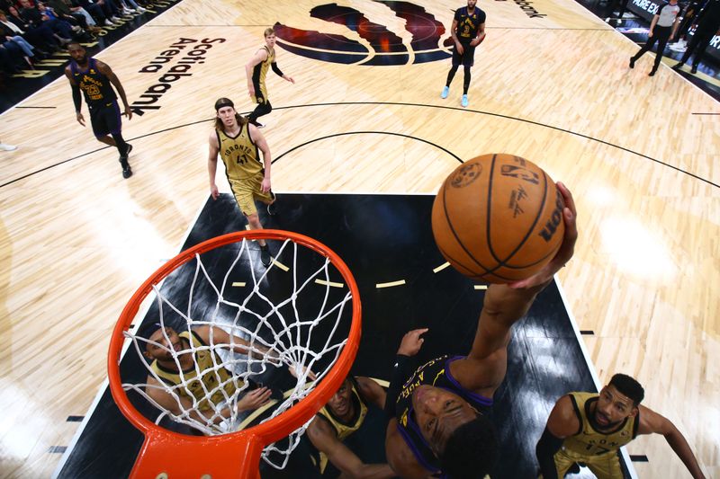 TORONTO, CANADA - APRIL 2: Rui Hachimura #28 of the Los Angeles Lakers drives to the basket during the game against the Toronto Raptors on April 2, 2024 at the Scotiabank Arena in Toronto, Ontario, Canada.  NOTE TO USER: User expressly acknowledges and agrees that, by downloading and or using this Photograph, user is consenting to the terms and conditions of the Getty Images License Agreement.  Mandatory Copyright Notice: Copyright 2023 NBAE (Photo by Vaughn Ridley/NBAE via Getty Images)