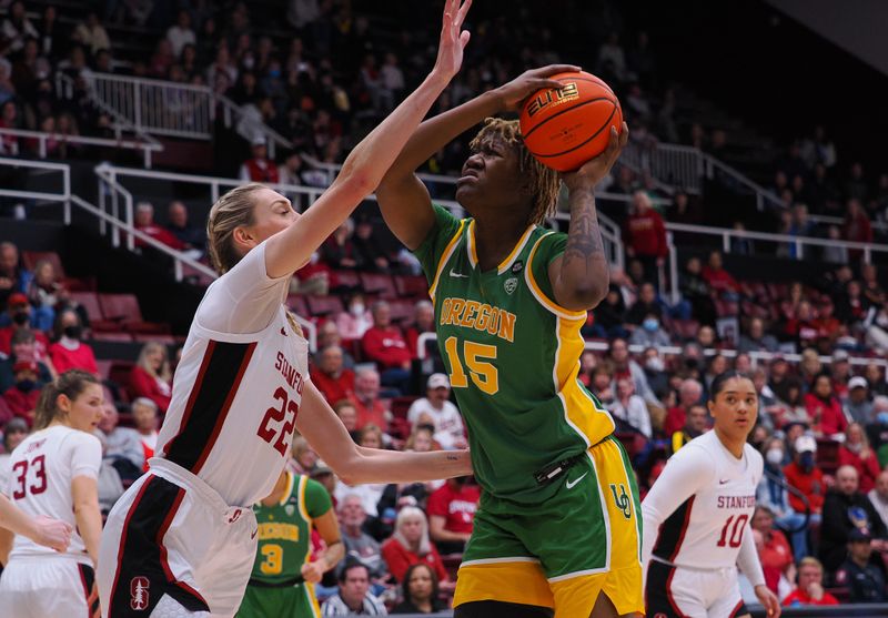 Jan 29, 2023; Stanford, California, USA; Oregon Ducks center Phillipina Kyei (15) looks to the basket against Stanford Cardinal forward Cameron Brink (22) during the second quarter at Maples Pavilion. Mandatory Credit: Kelley L Cox-USA TODAY Sports