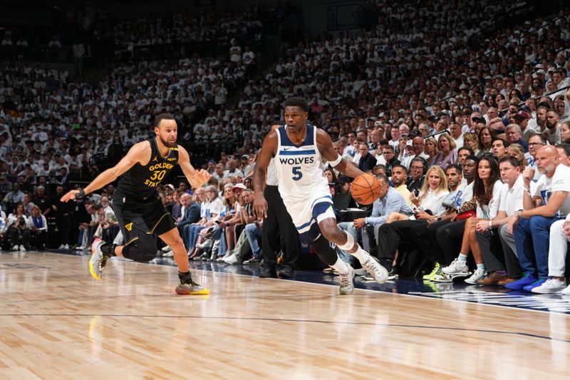 MINNEAPOLIS, MN -  MAY 6:  Anthony Edwards #5 of the Minnesota Timberwolves drives to the basket during the game against the Golden State Warriors during Round 2 Game 1 of the 2025 NBA Playoffs on May 6, 2025 at Target Center in Minneapolis, Minnesota. NOTE TO USER: User expressly acknowledges and agrees that, by downloading and or using this Photograph, user is consenting to the terms and conditions of the Getty Images License Agreement. Mandatory Copyright Notice: Copyright 2025 NBAE (Photo by Jesse D. Garrabrant/NBAE via Getty Images)