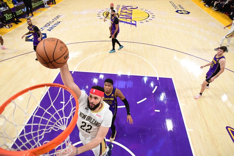 LOS ANGELES, CA - FEBRUARY 9:  Larry Nance Jr. #22 of the New Orleans Pelicans drives to the basket during the game against the Los Angeles Lakers on February 9, 2024 at Crypto.Com Arena in Los Angeles, California. NOTE TO USER: User expressly acknowledges and agrees that, by downloading and/or using this Photograph, user is consenting to the terms and conditions of the Getty Images License Agreement. Mandatory Copyright Notice: Copyright 2024 NBAE (Photo by Adam Pantozzi/NBAE via Getty Images)