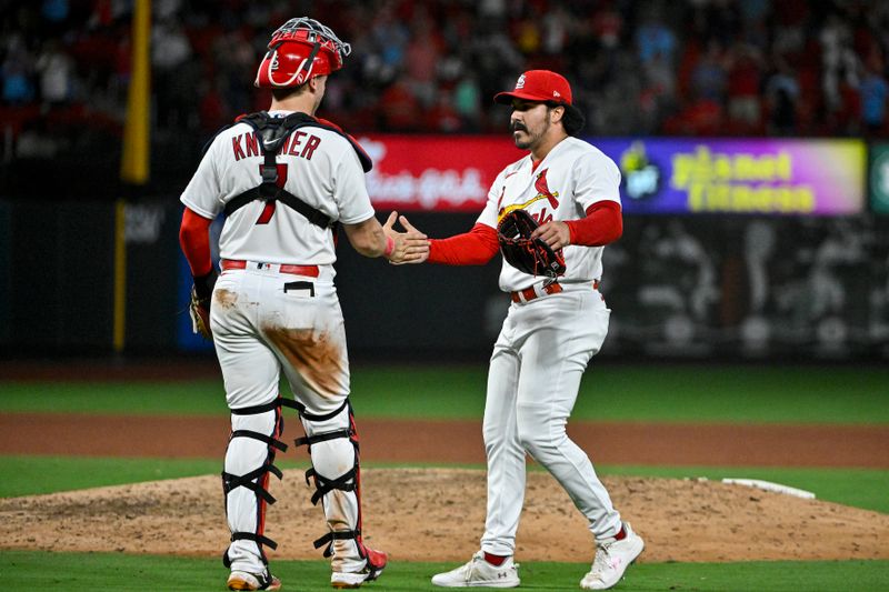 Aug 15, 2023; St. Louis, Missouri, USA;  St. Louis Cardinals relief pitcher JoJo Romero (59) celebrates with catcher Andrew Knizner (7) after the Cardinals defeated the Oakland Athletics at Busch Stadium. Mandatory Credit: Jeff Curry-USA TODAY Sports