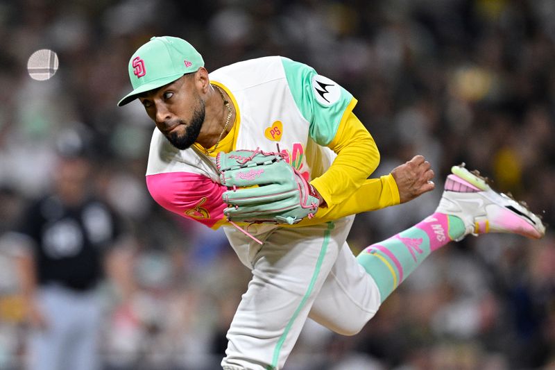 Sep 20, 2024; San Diego, California, USA; San Diego Padres relief pitcher Robert Suarez (75) pitches against the Chicago White Sox during the ninth inning at Petco Park. Mandatory Credit: Orlando Ramirez-Imagn Images