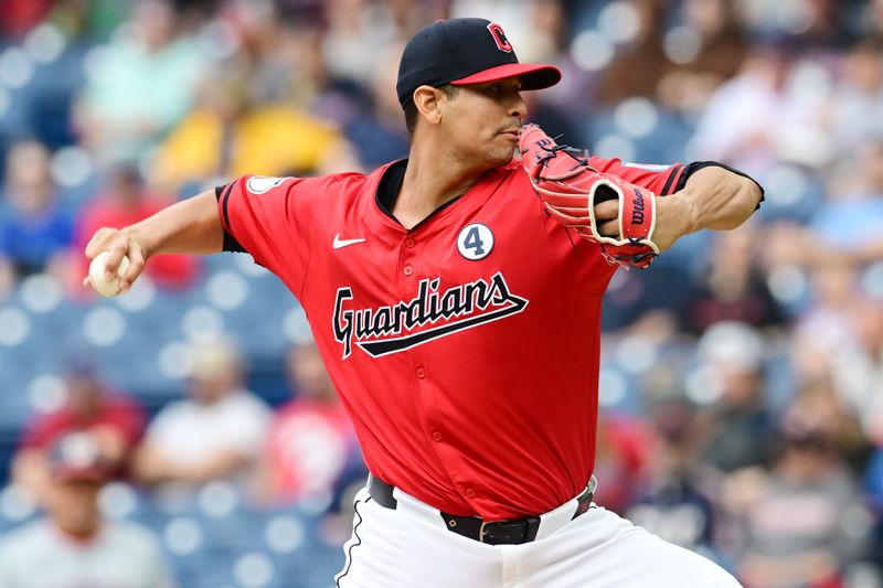 Jun 2, 2024; Cleveland, Ohio, USA; Cleveland Guardians pitcher Carlos Carrasco (59) throws a pitch during the first inning against the Washington Nationals at Progressive Field. Mandatory Credit: Ken Blaze-USA TODAY Sports
