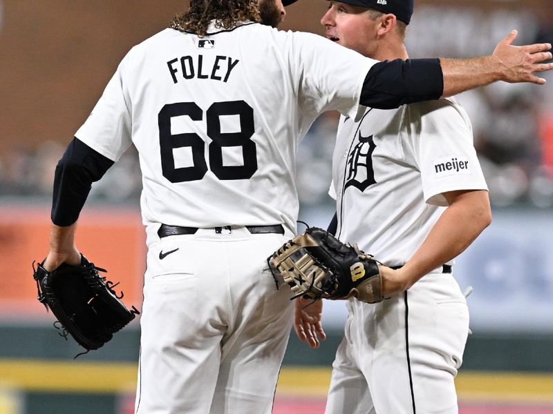 Sep 11, 2024; Detroit, Michigan, USA; Detroit Tigers pitcher Jason Foley (68) celebrates with  first baseman Spencer Torkelson (20) after defeating the Colorado Rockies at Comerica Park. Mandatory Credit: Lon Horwedel-Imagn Images