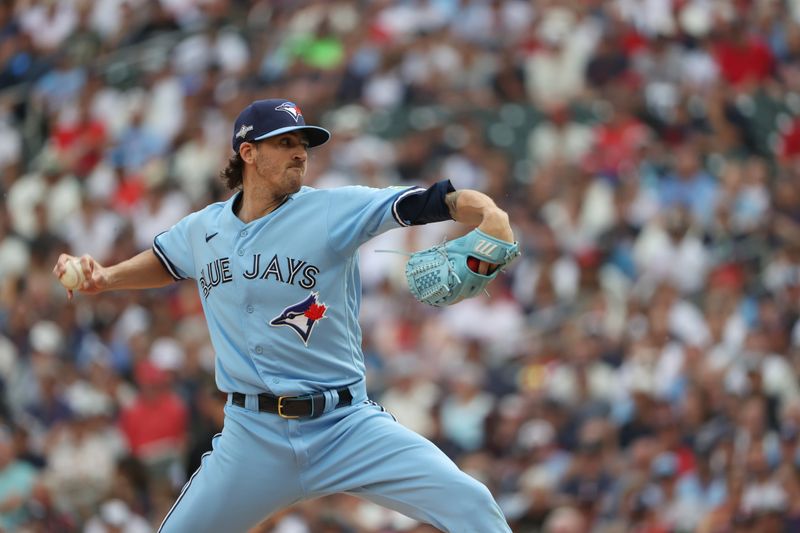 Oct 3, 2023; Minneapolis, Minnesota, USA; Toronto Blue Jays starting pitcher Kevin Gausman (34) throws out a pitch in the first inning against the Minnesota Twins during game one of the Wildcard series for the 2023 MLB playoffs at Target Field. Mandatory Credit: Jesse Johnson-USA TODAY Sports