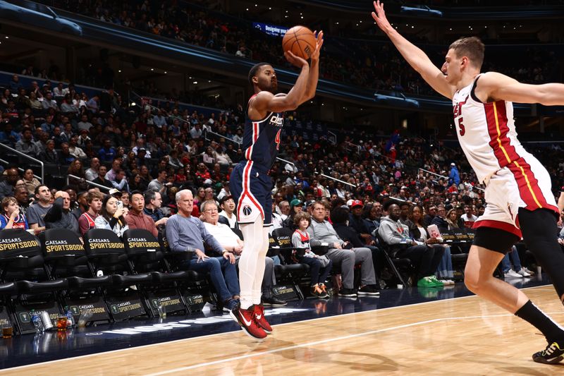 WASHINGTON, DC -? MARCH 31: Jared Butler #4 of the Washington Wizards shoots the ball during the game against the Miami Heat on March 31, 2024 at Capital One Arena in Washington, DC. NOTE TO USER: User expressly acknowledges and agrees that, by downloading and or using this Photograph, user is consenting to the terms and conditions of the Getty Images License Agreement. Mandatory Copyright Notice: Copyright 2024 NBAE (Photo by Kenny Giarla/NBAE via Getty Images)