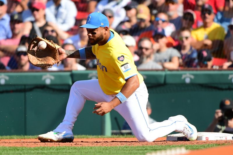 Aug 10, 2024; Boston, Massachusetts, USA;  Boston Red Sox first baseman Dominic Smith (2) fields the ball for an out during the third inning against the Houston Astros at Fenway Park. Mandatory Credit: Bob DeChiara-USA TODAY Sports