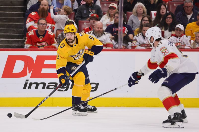 Mar 21, 2024; Sunrise, Florida, USA; Nashville Predators left wing Filip Forsberg (9) moves the puck against the Florida Panthers during the first period at Amerant Bank Arena. Mandatory Credit: Sam Navarro-USA TODAY Sports