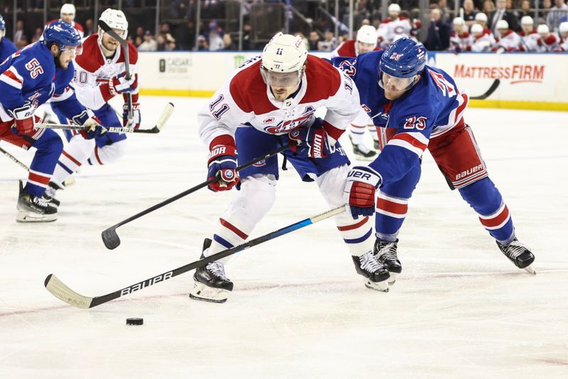 Apr 7, 2024; New York, New York, USA;  Montreal Canadiens right wing Brendan Gallagher (11) and New York Rangers defenseman Adam Fox (23) battle for control of the puck at Madison Square Garden. Mandatory Credit: Wendell Cruz-USA TODAY Sports