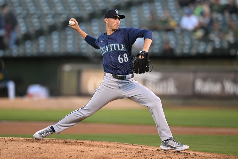 Sep 4, 2024; Oakland, California, USA; Seattle Mariners starting pitcher George Kirby (68) throws against the Oakland Athletics in the first inning at Oakland-Alameda County Coliseum. Mandatory Credit: Eakin Howard-Imagn Images