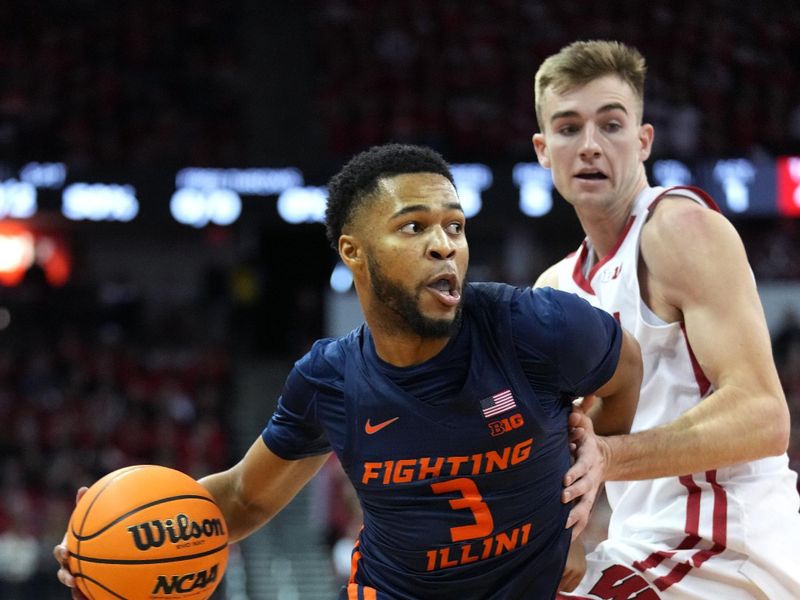 Jan 28, 2023; Madison, Wisconsin, USA;  Illinois Fighting Illini guard Jayden Epps (3) dribbles the ball under coverage by Wisconsin Badgers forward Tyler Wahl (5) during the first half at the Kohl Center. Mandatory Credit: Kayla Wolf-USA TODAY Sports