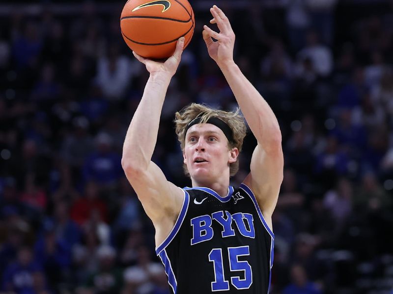 Dec 1, 2023; Salt Lake City, Utah, USA; Brigham Young Cougars guard Richie Saunders (15) shoots the ball against the Fresno State Bulldogs during the first half at Delta Center. Mandatory Credit: Rob Gray-USA TODAY Sports