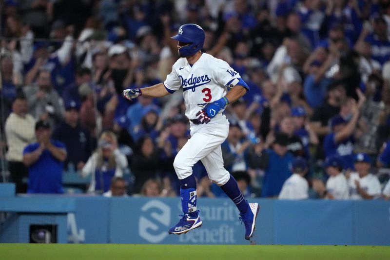 Jun 15, 2023; Los Angeles, California, USA; Los Angeles Dodgers third baseman Chris Taylor (3) rounds the bases on a grand slam home run in the sixth inning against the Chicago White Sox at Dodger Stadium. Mandatory Credit: Kirby Lee-USA TODAY Sports